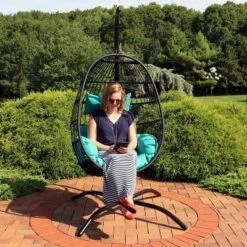 Sunnydaze Decor Sunnydaze Outdoor Resin Wicker Patio Dalia Hanging Basket Egg Chair With Cushions, Headrest, And Steel Stand Set - Teal - 3pc 19 Sunnydaze Decor Sunnydaze Outdoor Resin Wicker Patio Dalia Hanging Basket Egg Chair With Cushions, Headrest, And Steel Stand Set - Teal - 3pc -Furniture GUEST 3776b64b ab75 4ffb a442 a493b35ccab9