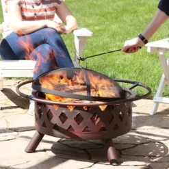 Sunnydaze Decor Sunnydaze Outdoor Camping Or Backyard Crossweave Cut Out Fire Pit With Spark Screen, Log Poker, And Metal Wood Grate - Bronze -Furniture GUEST a8fcb32a ec37 4322 bea9 015441fcd73f