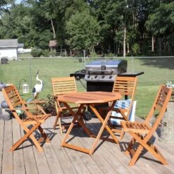 Sunnydaze Decor Sunnydaze Outdoor Meranti Wood With Teak Oil Finish Folding Patio Dining Table And Chairs - Brown - 5pc -Furniture GUEST b203cc01 fad2 43cf bc26 3db53d52db63
